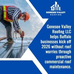 A commercial roofer in a safety vest and hard hat uses a power drill on a metal roof.